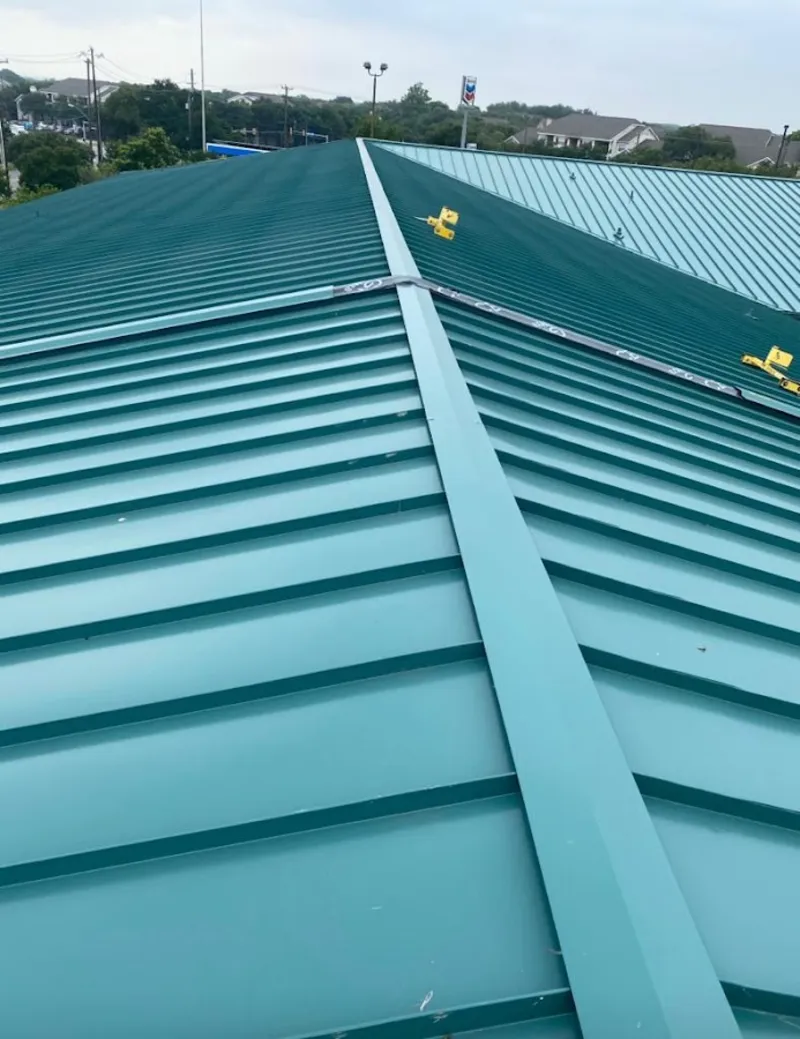Green commercial metal roof ridge and valley for Metal Roof Repair in Allegan