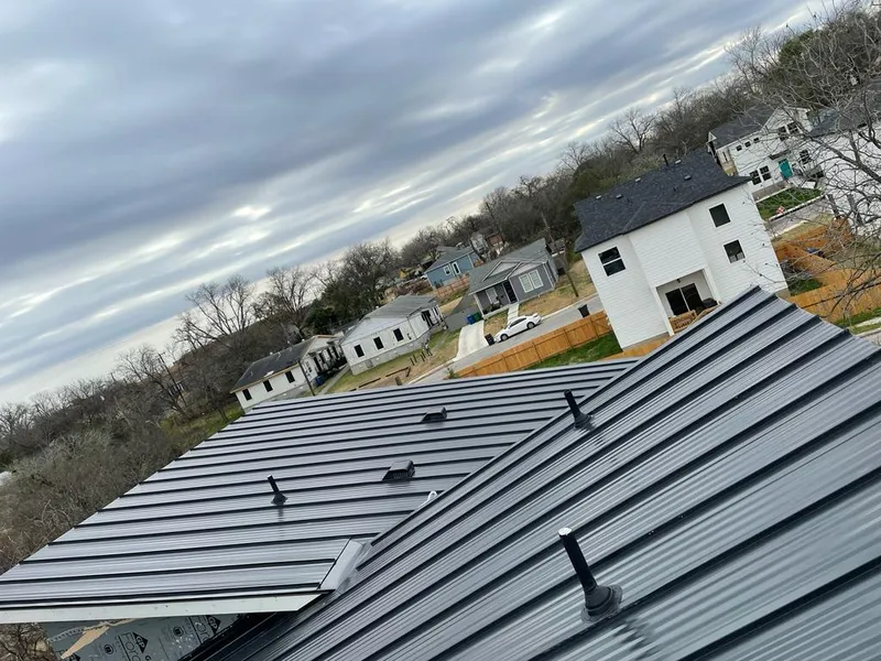 Standing seam metal roof panels with vents for Skylight Repair in Allegan